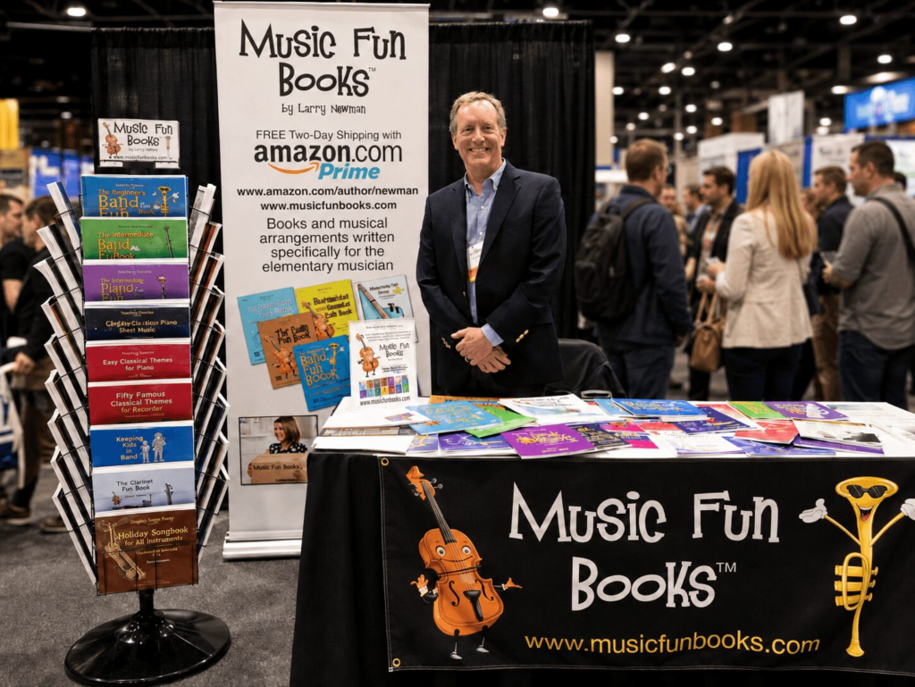Larry Newman with Music Fun Books display at a music education conference